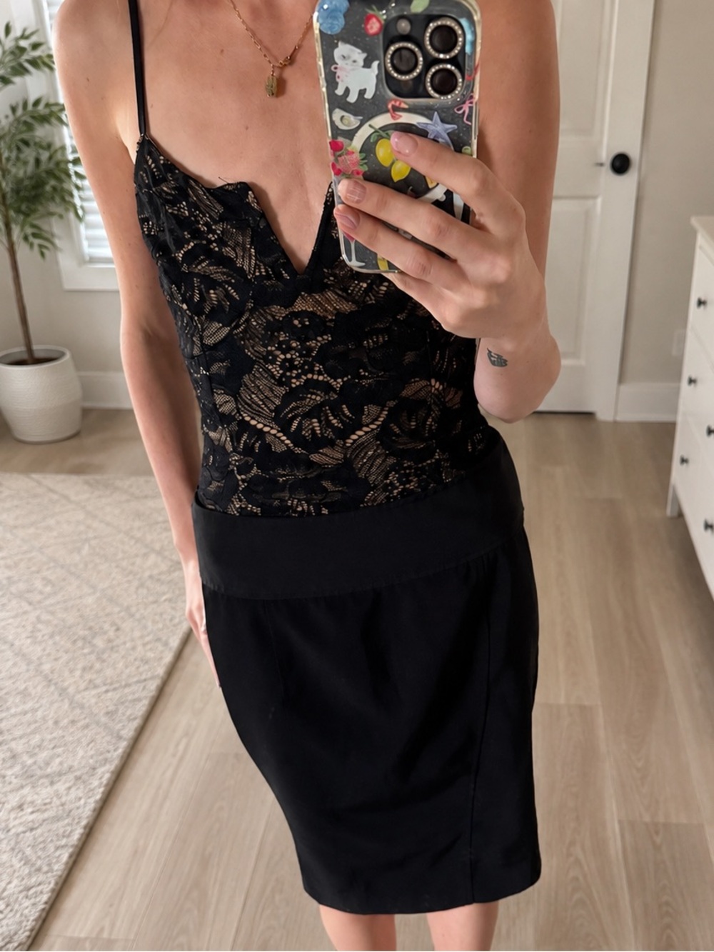 Lulu's Black Lace Bodysuit with Nude Lining